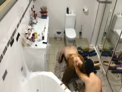A masked man fucking a female while spreading crap on her back